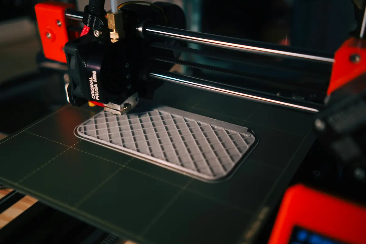 Prusa 3D printer producing caravan part
