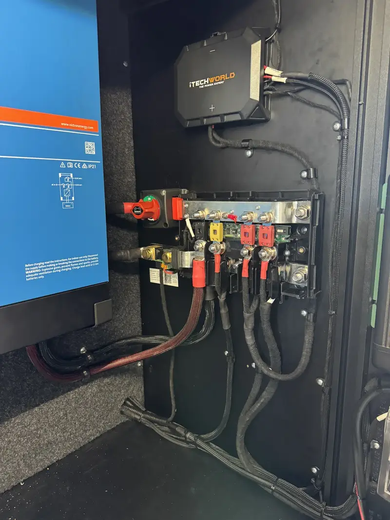 Victron and iTechWorld electrical panel with bus bars and DC-DC charger