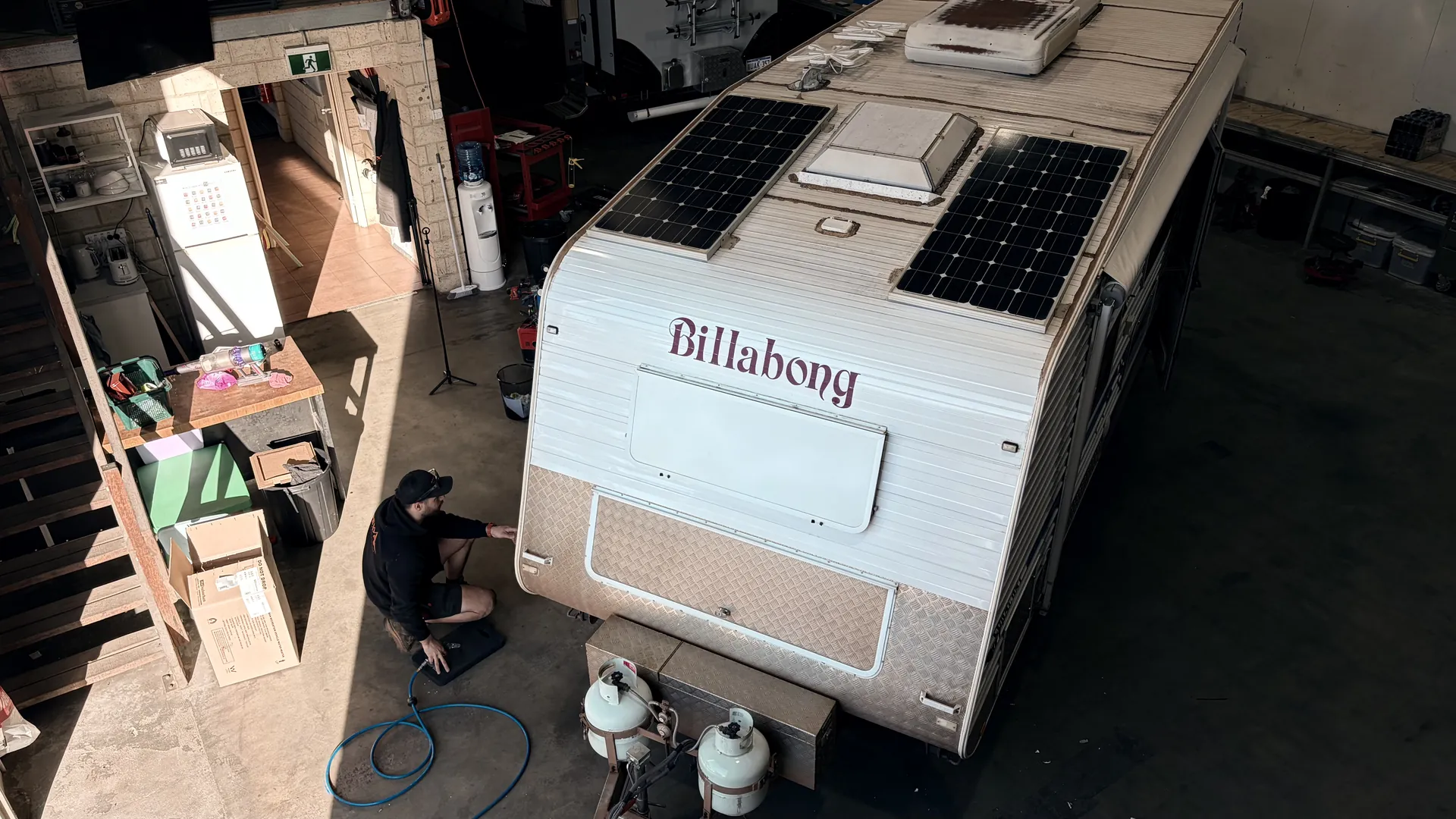 Apex technician carrying out repairs to a caravan in the Maddington workshop