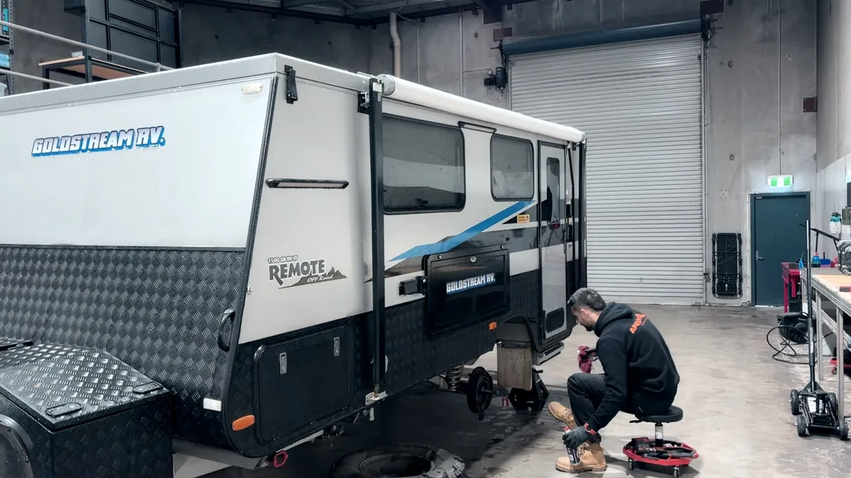 Goldstream RV side view in Apex workshop